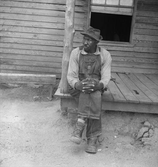 Father of sharecropper family, Person County, North Carolina, 1939. Creator: Dorothea Lange.