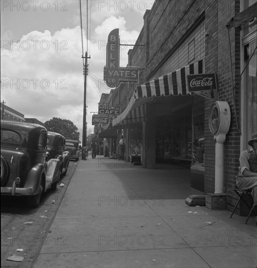 The main street, Fayetteville Street, of Siler City, North Carolina, 1939. Creator: Dorothea Lange.