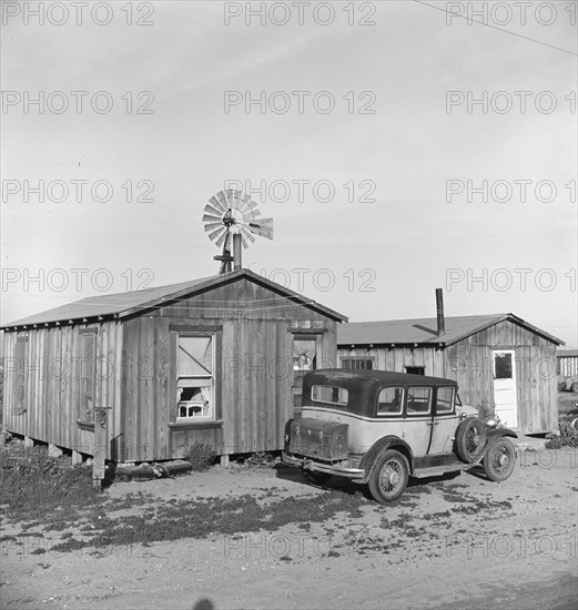 Cabins which rent for ten dollars..., Arkansawyers auto camp, Greenfield, Salinas Valley, CA, 1939. Creator: Dorothea Lange.