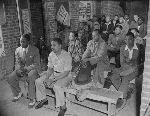 Air raid wardens' meeting in zone nine, Southwest area, Washington, D.C, 1942. Creator: Gordon Parks.