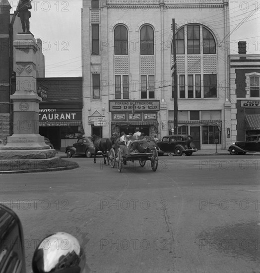 Small agricultural center, Oxford, North Carolina, 1939. Creator: Dorothea Lange.