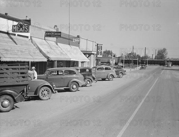 Saturday afternoon, main street of Nyssa, Oregon, 1939. Creator: Dorothea Lange.