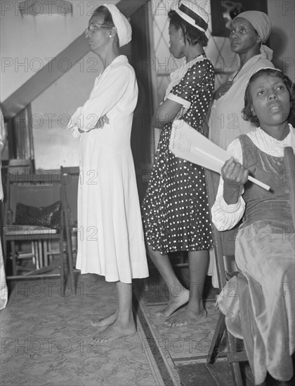 As in Moses' time, members of the St. Martins Spiritual Church remove..., Washington, D.C., 1942. Creator: Gordon Parks.