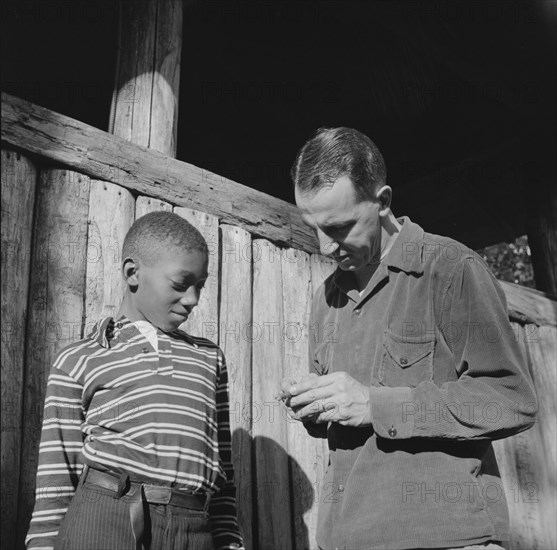 Mr. Lewis Traver, the director, with camper at Camp Nathan Hale, Southfields, New York, 1943 Creator: Gordon Parks.