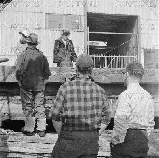 Fishermen's families often make trips down from New England towns to be..., New York, 1943. Creator: Gordon Parks.