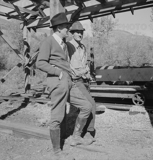 Possibly: Men working in mill, Ola self-help sawmill co-op, Gem County, Idaho, 1939. Creator: Dorothea Lange.