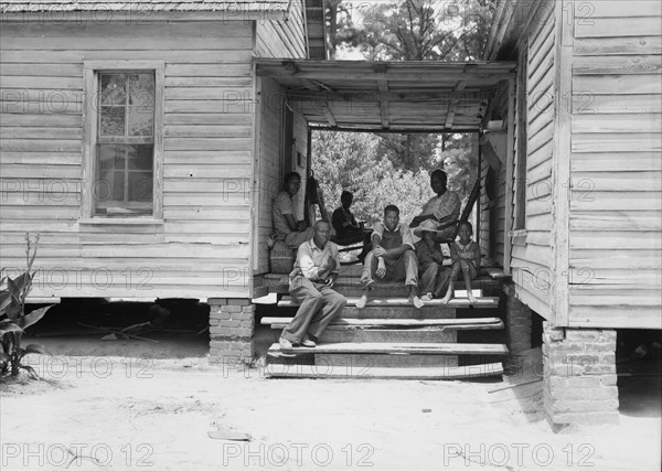 Zollie Lyons, Negro sharecropper, home from the field..., Upchurch, North Carolina, 1939. Creator: Dorothea Lange.