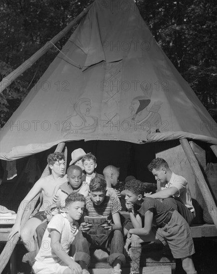 Comic papers, Camp Nathan Hale, Southfields, New York, 1943. Creator: Gordon Parks.