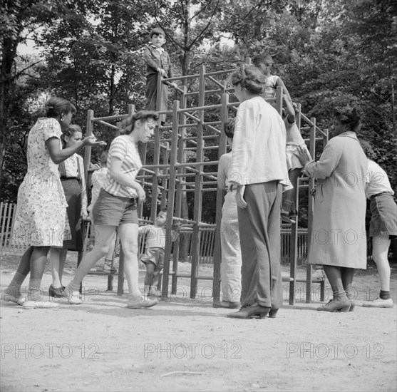 Mothers supervising their children at Camp Ellen Marvin, Arden, New York, 1943. Creator: Gordon Parks.