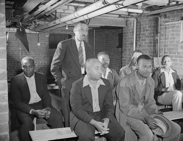 Air raid wardens' meeting in zone nine, Southwest area, Washington, D.C, 1942. Creator: Gordon Parks.