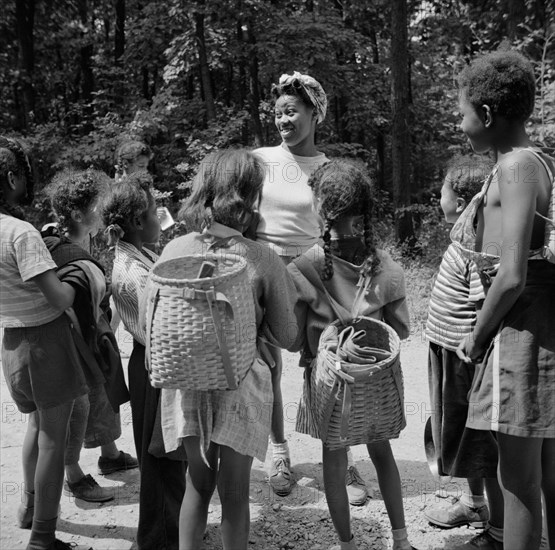 Campers hiking at Camp Fern Rock, Bear Mountain, New York, 1943. Creator: Gordon Parks.