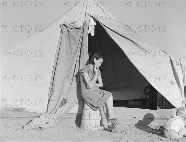 Young migrant mother..., FSA emergency camp, Calipatria, California, 1939. Creator: Dorothea Lange.