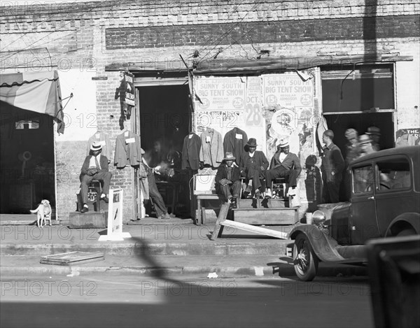 Sidewalk scene in Selma, Alabama, 1935. Creator: Walker Evans.