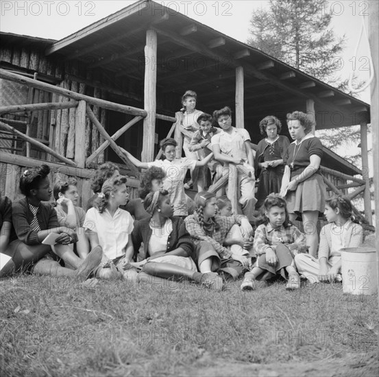 Planning a day's activity at Camp Gaylord White, Arden, New York, 1943. Creator: Gordon Parks.