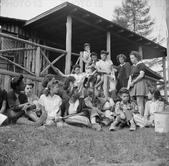 Planning a day's activity at Camp Gaylord White, Arden, New York, 1943. Creator: Gordon Parks.