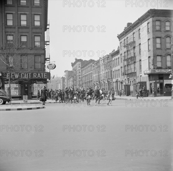 Many accidents are attributed to unpatrolled intersections in Harlem, New York, 1943. Creator: Gordon Parks.