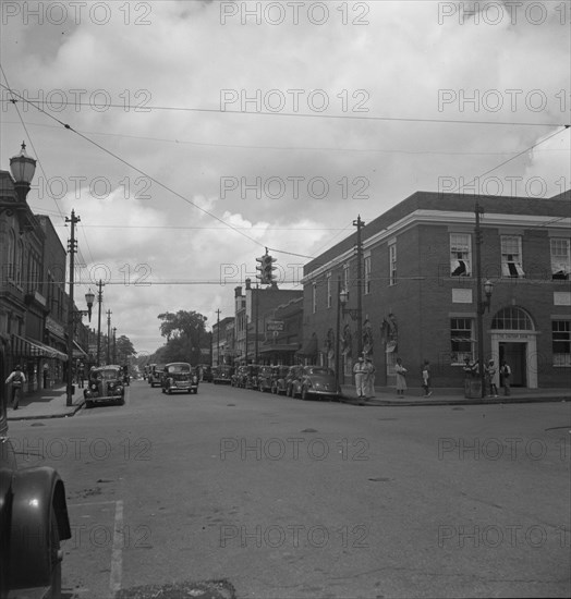 The main street, Fayetteville Street, of Siler City, North Carolina, 1939. Creator: Dorothea Lange.