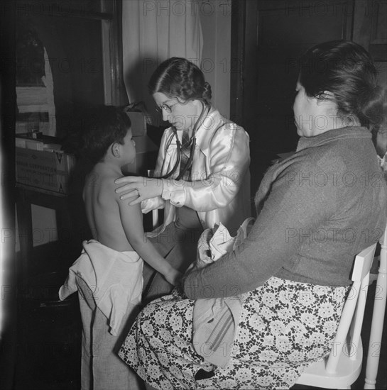 Visiting public health doctor conducts well-baby clinic..., Calipatria, Imperial Valley, 1939. Creator: Dorothea Lange.