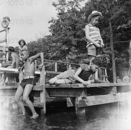 Fishing at Camp Nathan Hale, Southfields, New York, 1943. Creator: Gordon Parks.