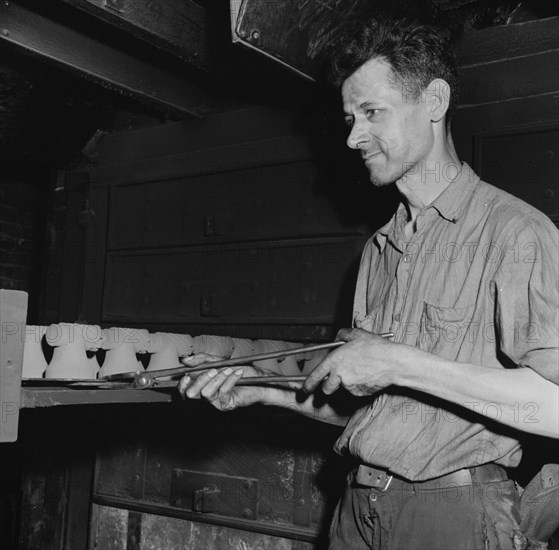 Hot cores to be used by the U.S. Army to make molds for meat..., New Britain, Connecticut, 1943. Creator: Gordon Parks.