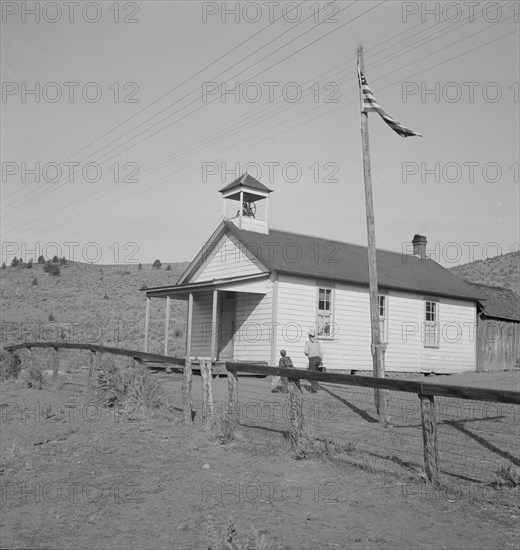 Nine a.m., four pupils attend this day, of the seven...eastern Oregon county school, 1939. Creator: Dorothea Lange.