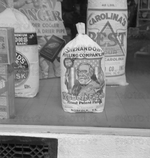 A grocery window, 1939. Creator: Dorothea Lange.