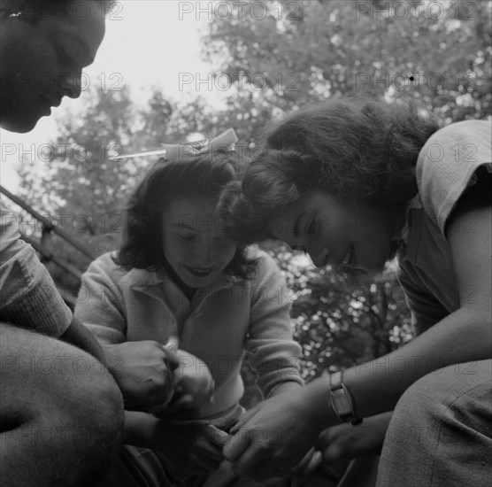 Campers helping with the kitchen work at Camp Ellen Marvin, Arden, New York, 1943. Creator: Gordon Parks.