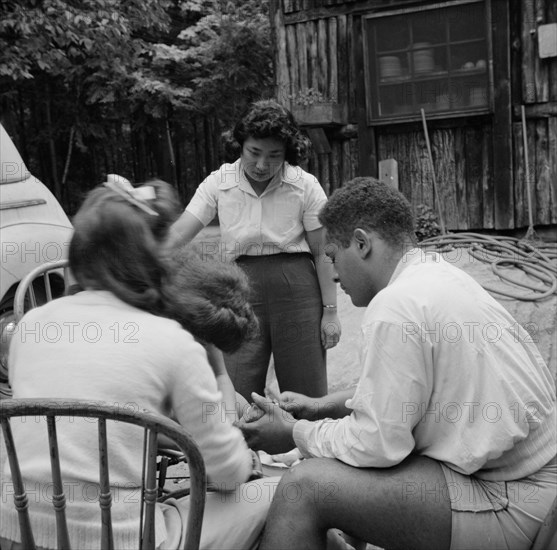 Campers helping with the kitchen work at Camp Ellen Marvin, Arden, New York, 1943. Creator: Gordon Parks.