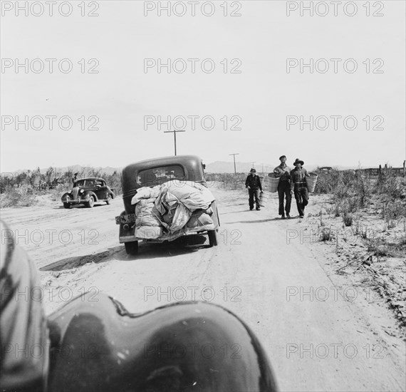 Migratory family arriving at grower's camp for pickers, Imperial Valley, California, 1939. Creator: Dorothea Lange.