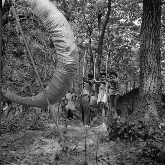 Practicing on the archery range at Camp Fern Rock, Bear Mountain, New York, 1943 Creator: Gordon Parks.