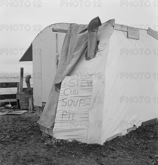 Outside of potato pickers' camp, across from the..., Tulelake, Siskiyou County, California, 1939. Creator: Dorothea Lange.