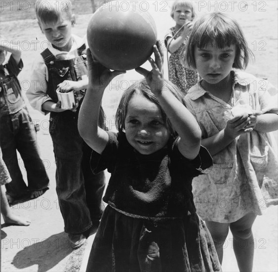 Nursery school, showing migrant children playing, FSA camp, Tulare County, 1939. Creator: Dorothea Lange.