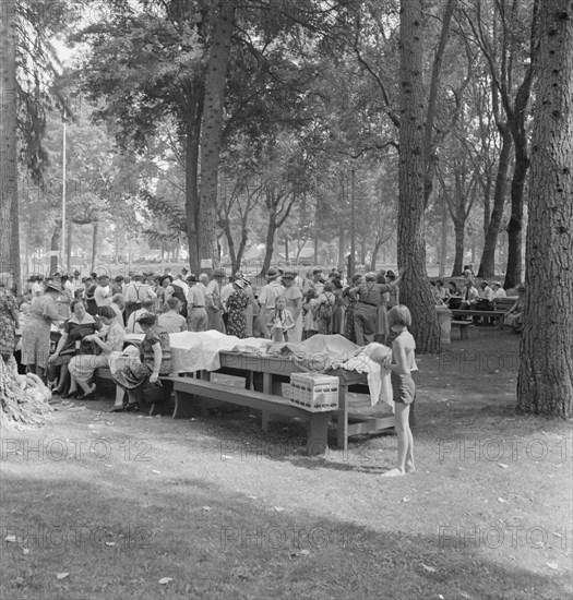 California Day, a picnic in town park on the Rogue River, Grants Pass, Oregon, 1939. Creator: Dorothea Lange.