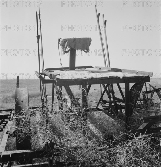 Possibly: Farm machinery left on abandoned dry land farm in Columbian Basin, Washington, 1939. Creator: Dorothea Lange.