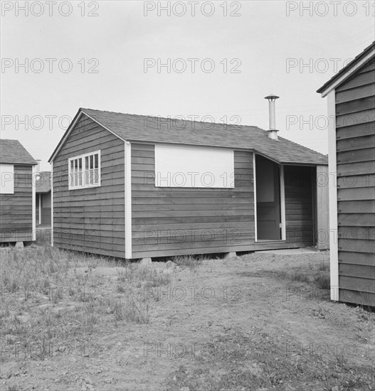 Shows new type of wooden shelter for migratory workers, FSA camp, near McMinnville, Oregon, 1939. Creator: Dorothea Lange.