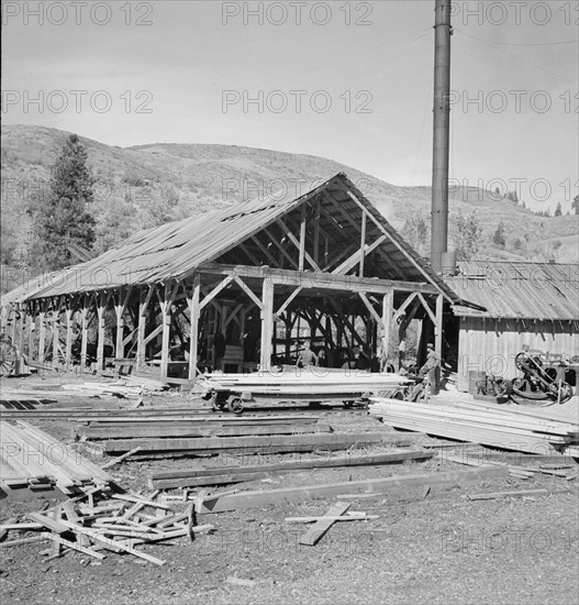 Possibly: The sawmill in operation, Ola self-help sawmill co-op, Gem County, Idaho, 1939. Creator: Dorothea Lange.