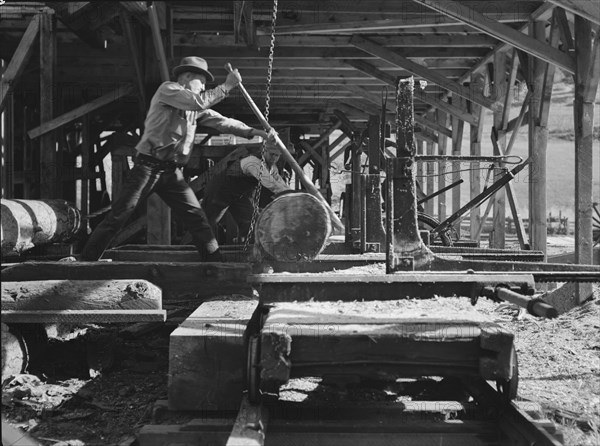 Possibly: The sawmill in operation, Ola self-help sawmill co-op, Gem County, Idaho, 1939. Creator: Dorothea Lange.