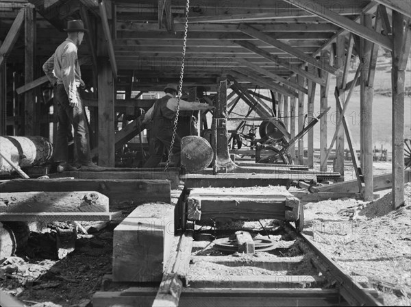 Possibly: The sawmill in operation, Ola self-help sawmill co-op, Gem County, Idaho, 1939. Creator: Dorothea Lange.