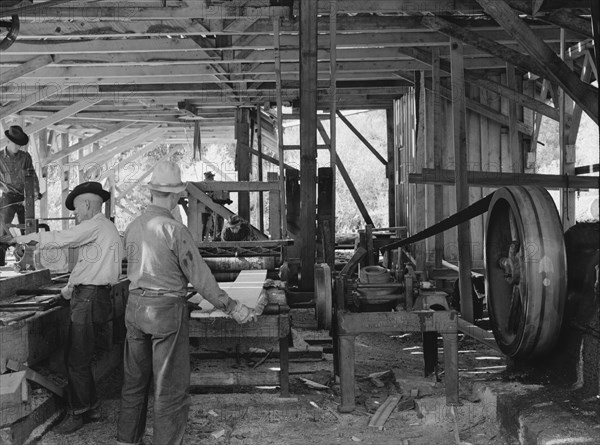 Possibly: The sawmill in operation, Ola self-help sawmill co-op, Gem County, Idaho, 1939. Creator: Dorothea Lange.