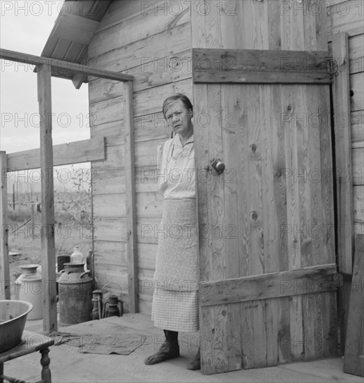 Possibly: New settler shows fish he caught..., Priest River Valley, Bonner County, Idaho, 1939. Creator: Dorothea Lange.