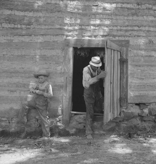 Possibly: Tobacco people take it easy..., Granville County, North Carolina, 1939. Creator: Dorothea Lange.