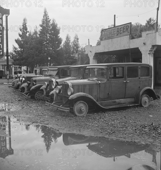 Roadside used car display on State Highway 17, Santa Clara County, California, 1939. Creator: Dorothea Lange.