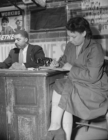 Air raid wardens' meeting in zone nine, Southwest area, Washington, D.C, 1942. Creator: Gordon Parks.