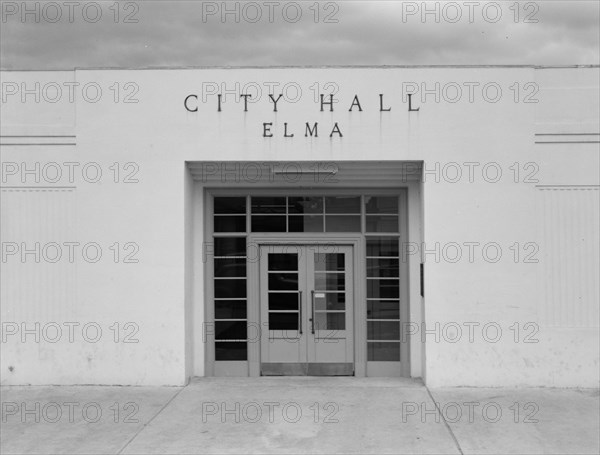 Modern building adjoining power company..., Elma, Grays Harbor County, Western Washington, 1939. Creator: Dorothea Lange.
