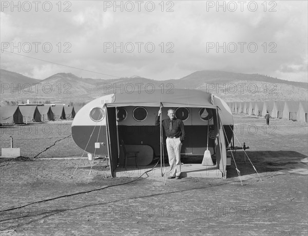 The camp manager, the office trailer and view of FSA camp, Merrill, Klamath County, Oregon, 1939. Creator: Dorothea Lange.