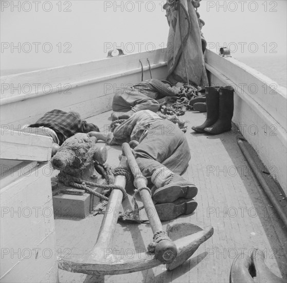 A fisherman's work is hard and many times they fall exhausted..., Gloucester, Massachusetts, 1943. Creator: Gordon Parks.