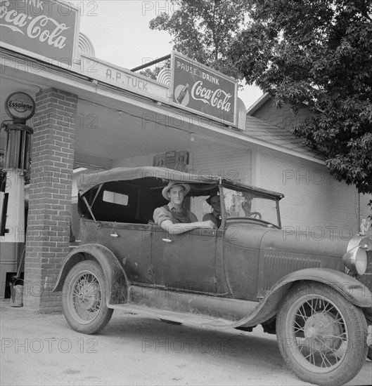 Young North Carolinian in old Ford, Person County, North Carolina, 1939. Creator: Dorothea Lange.