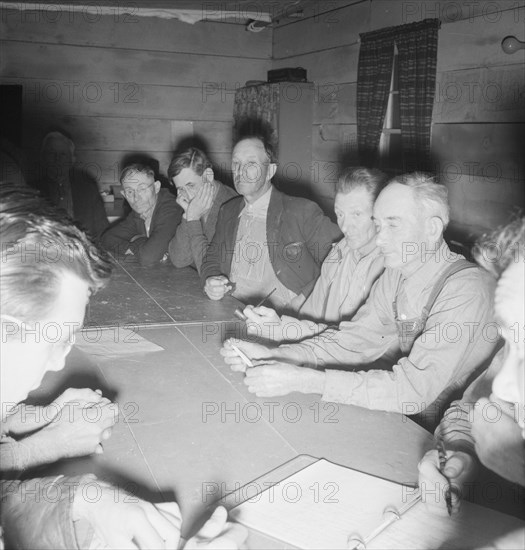 Meeting of the camp council, FSA camp, Farmersville, California, 1939. Creator: Dorothea Lange.