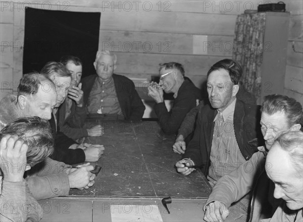 Meeting of the camp council, FSA camp, Farmersville, California, 1939. Creator: Dorothea Lange.