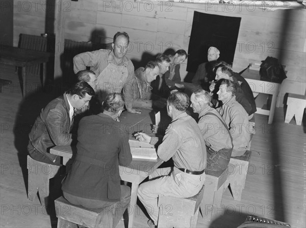 Meeting of the camp council, FSA camp, Farmersville, California, 1939. Creator: Dorothea Lange.